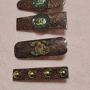 CHANEL Glittery Brown Hair Clips with Gold Details